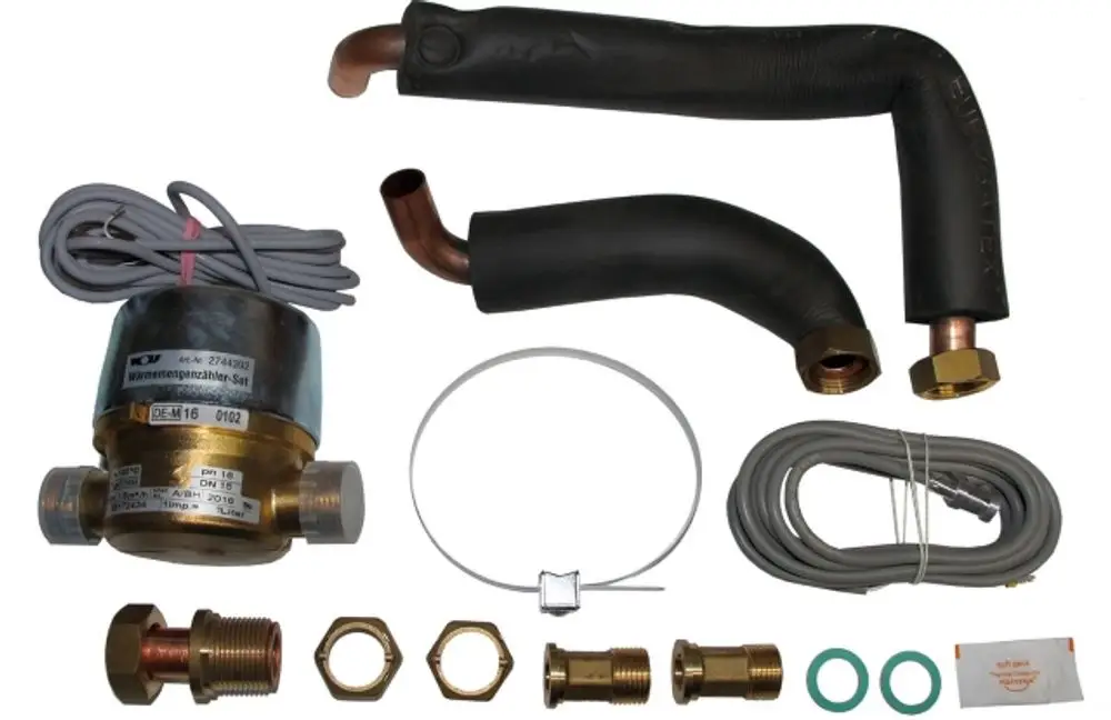 Wolf Wärmemengenzähler-Set mit Messgerät, Rohren, Anschlüssen und Kabeln zur Ertragsmessung, geeignet für den Einbau in Heizsysteme.